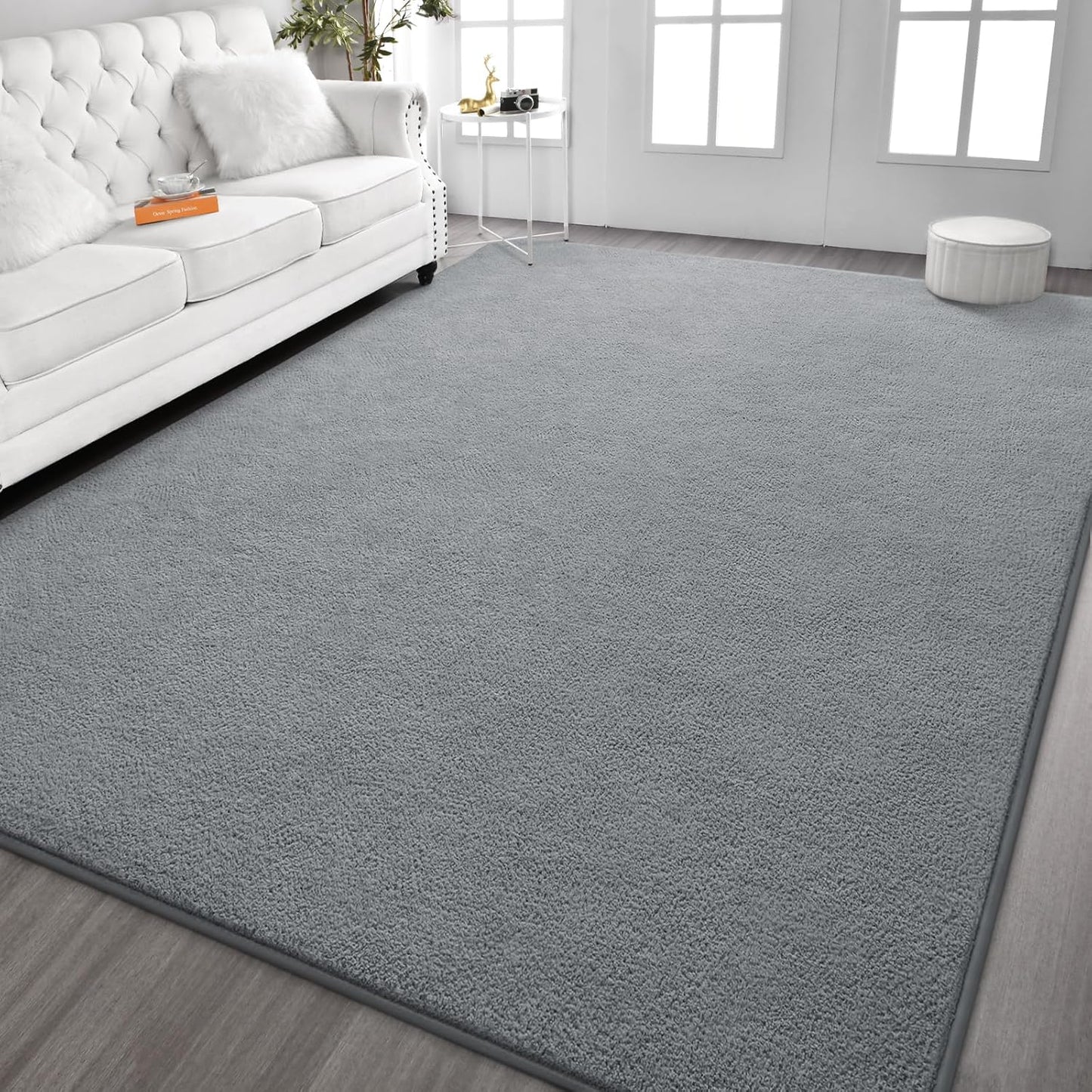 Kimicole 7x10 Washable Area Rugs for Living Room Bedroom, Large Low Pile Ulta-Thin Solid Color Rug, Non-Slip Soft Fluffy Carpet for Nursery Kids Room Dorm Room Home Decor (Grey)
