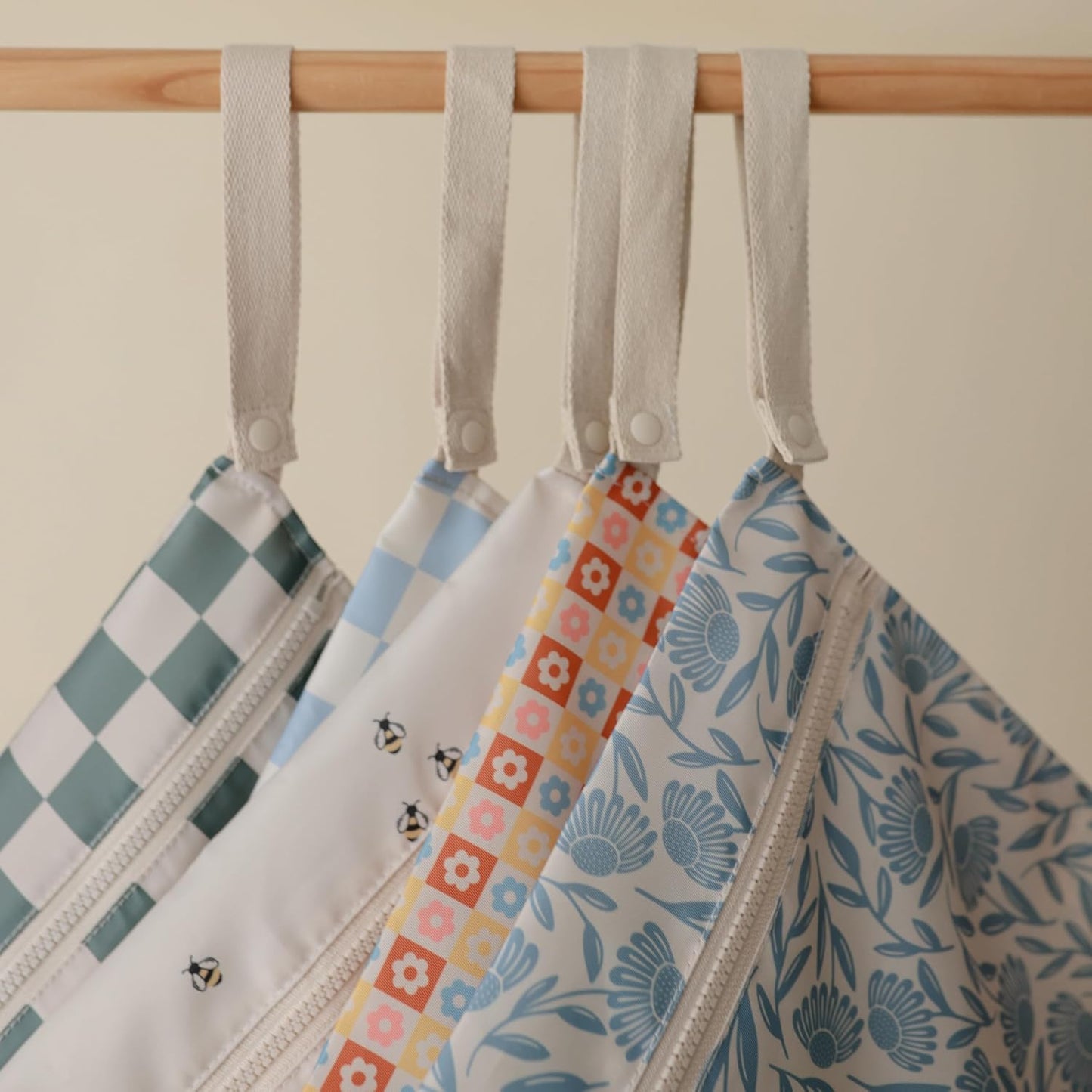 mushie Water Resistant Wet Bags | Large & Small Reusable Storage Bag for Baby Items and Travel | Zippered Pockets with Handle | Machine Washable, Set of 2 (Blue Flowers)