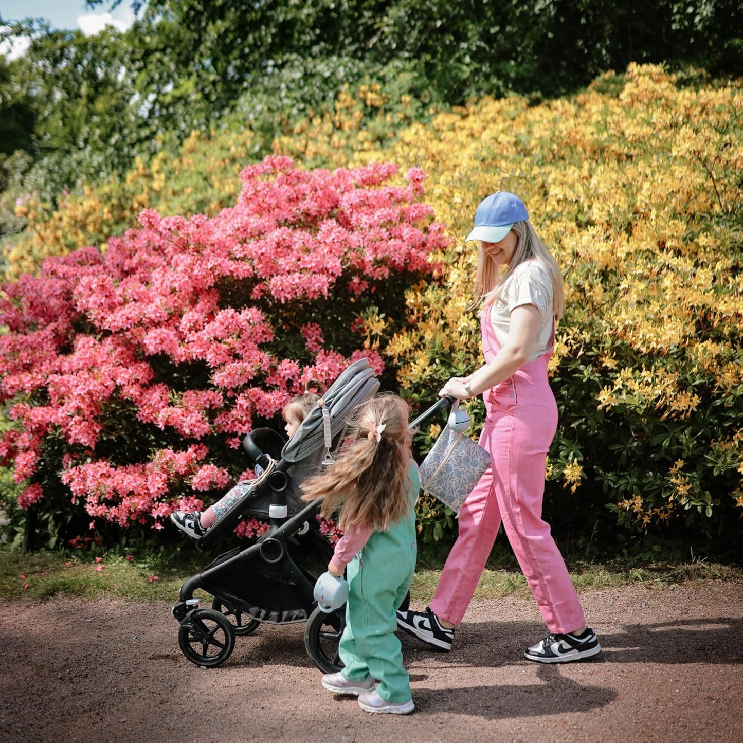 mushie Water Resistant Wet Bags | Large & Small Reusable Storage Bag for Baby Items and Travel | Zippered Pockets with Handle | Machine Washable, Set of 2 (Rainbows)